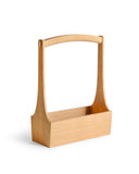 Small wooden table caddy by Aizawa with long handles on a white background
