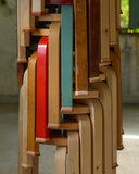 Stools stacked wearing shoes by Artek and Hender Scheme 