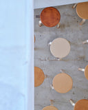 Stools with shoes by Artek and Hender Scheme 