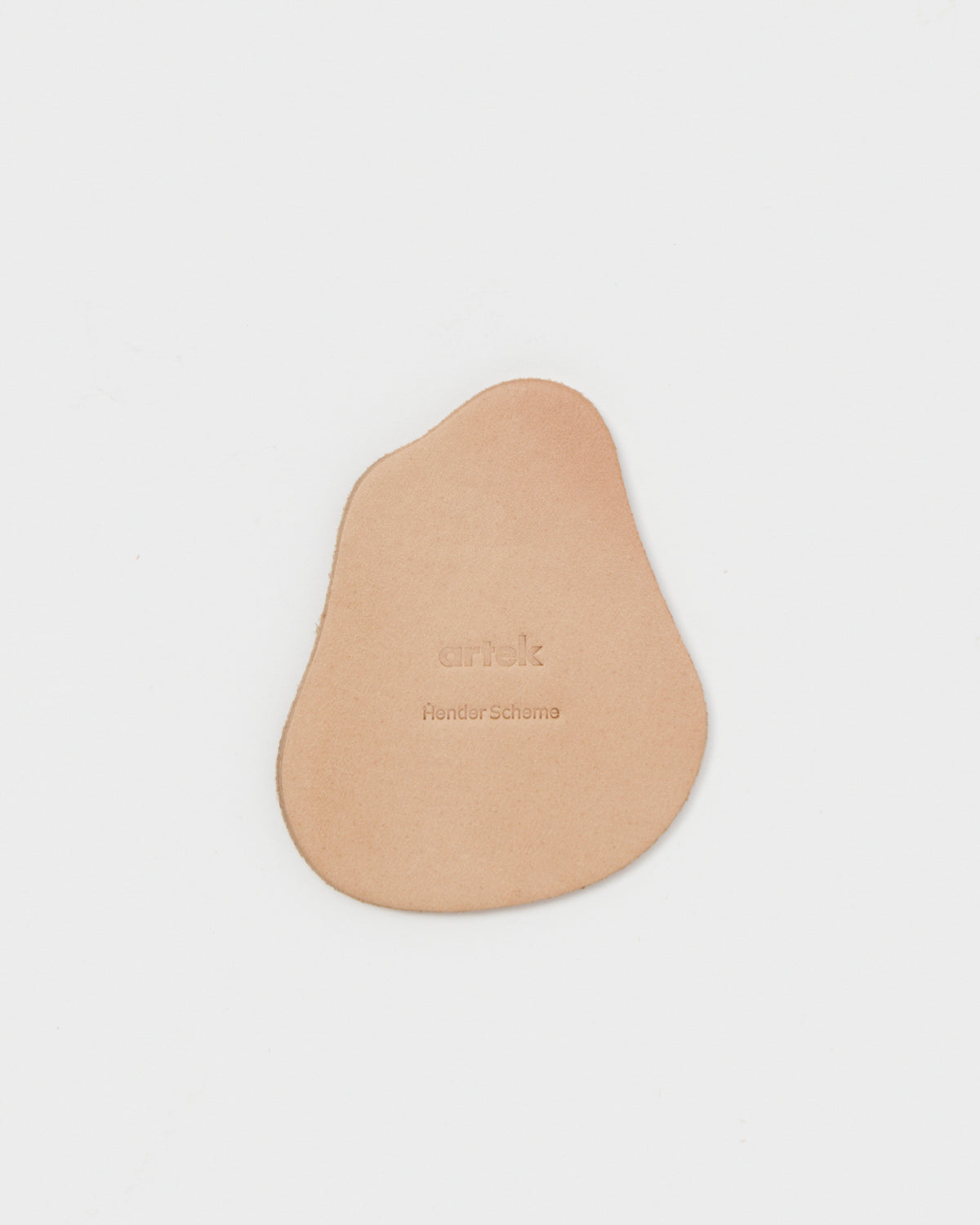 Coaster by Hender Scheme and Artek on a gray background