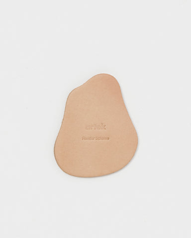 Coaster by Hender Scheme and Artek on a gray background