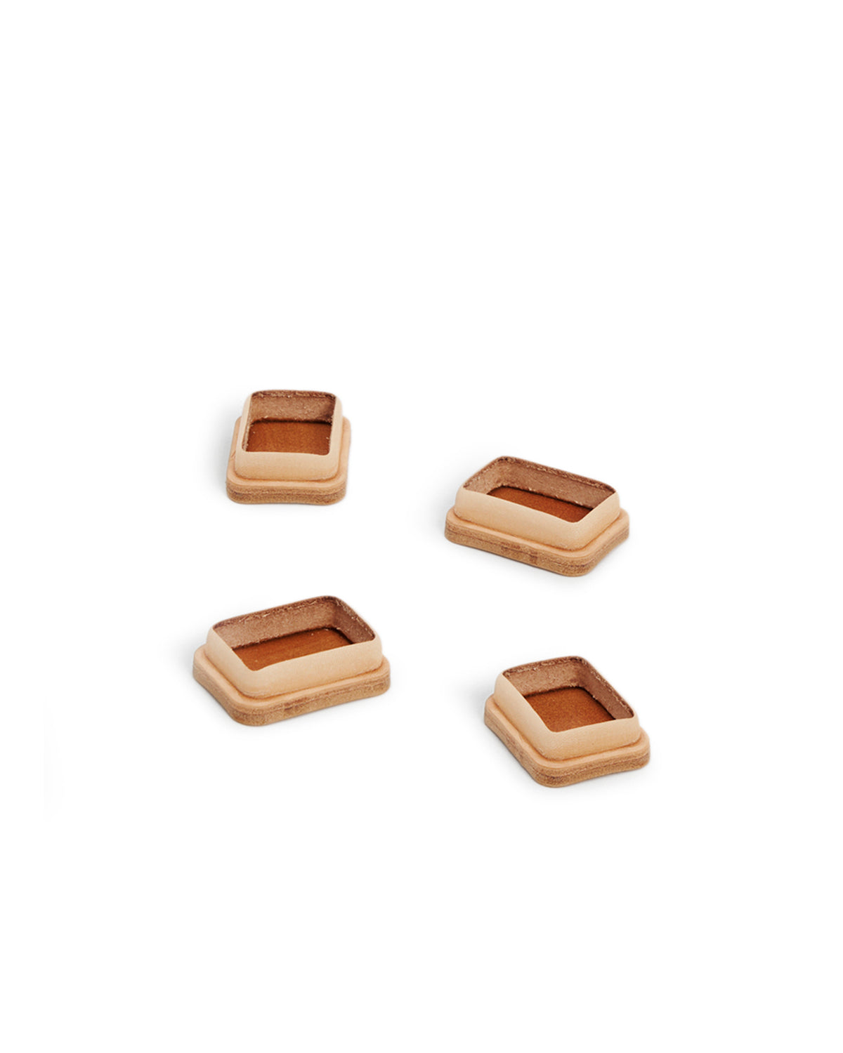 Set of 4 Shoes by Artek and Hender Scheme on white background