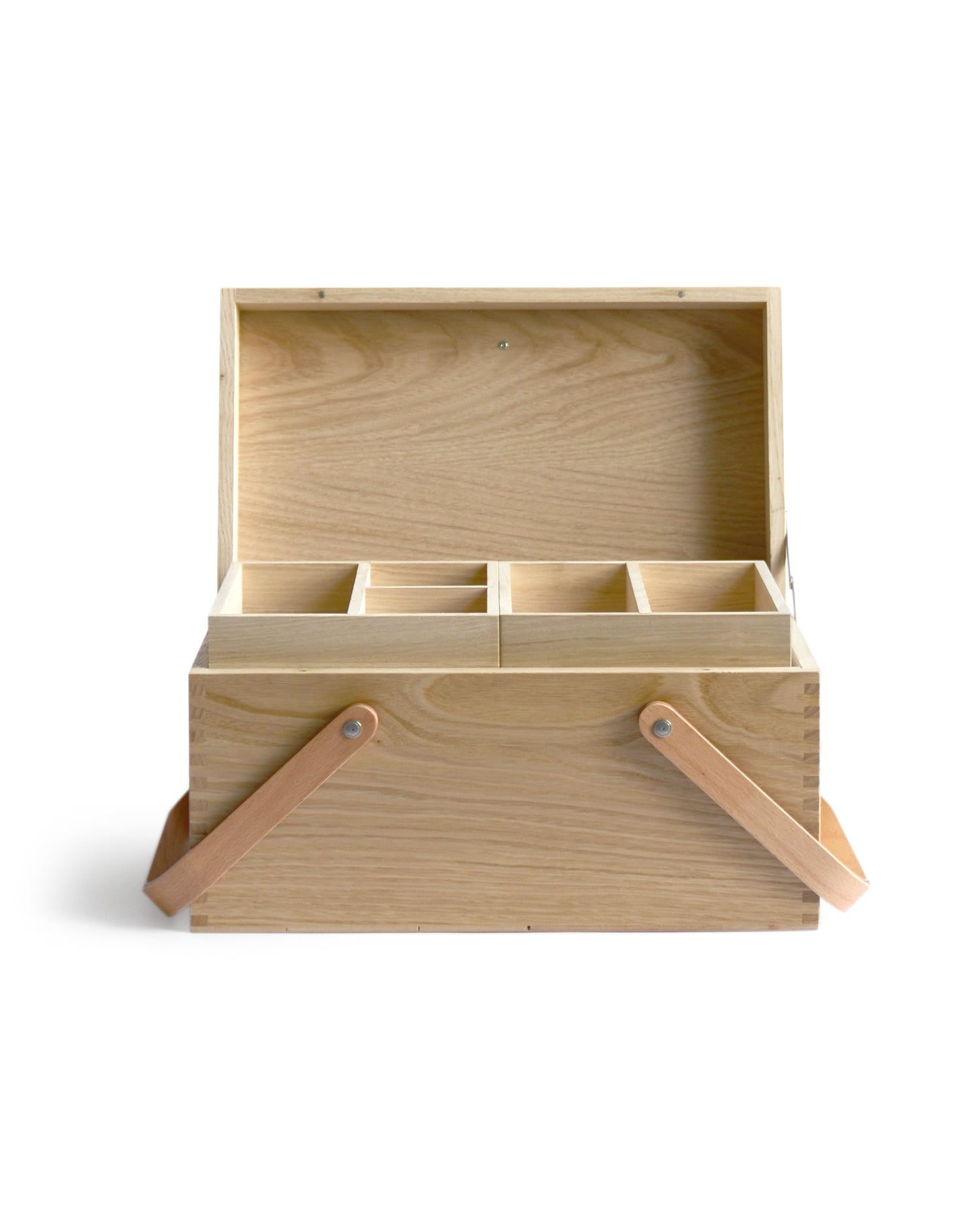 Silhouetted image of  open chestnut wood picnic box featuring wood joinery on edges by Shinsuke Tanabe against white background.