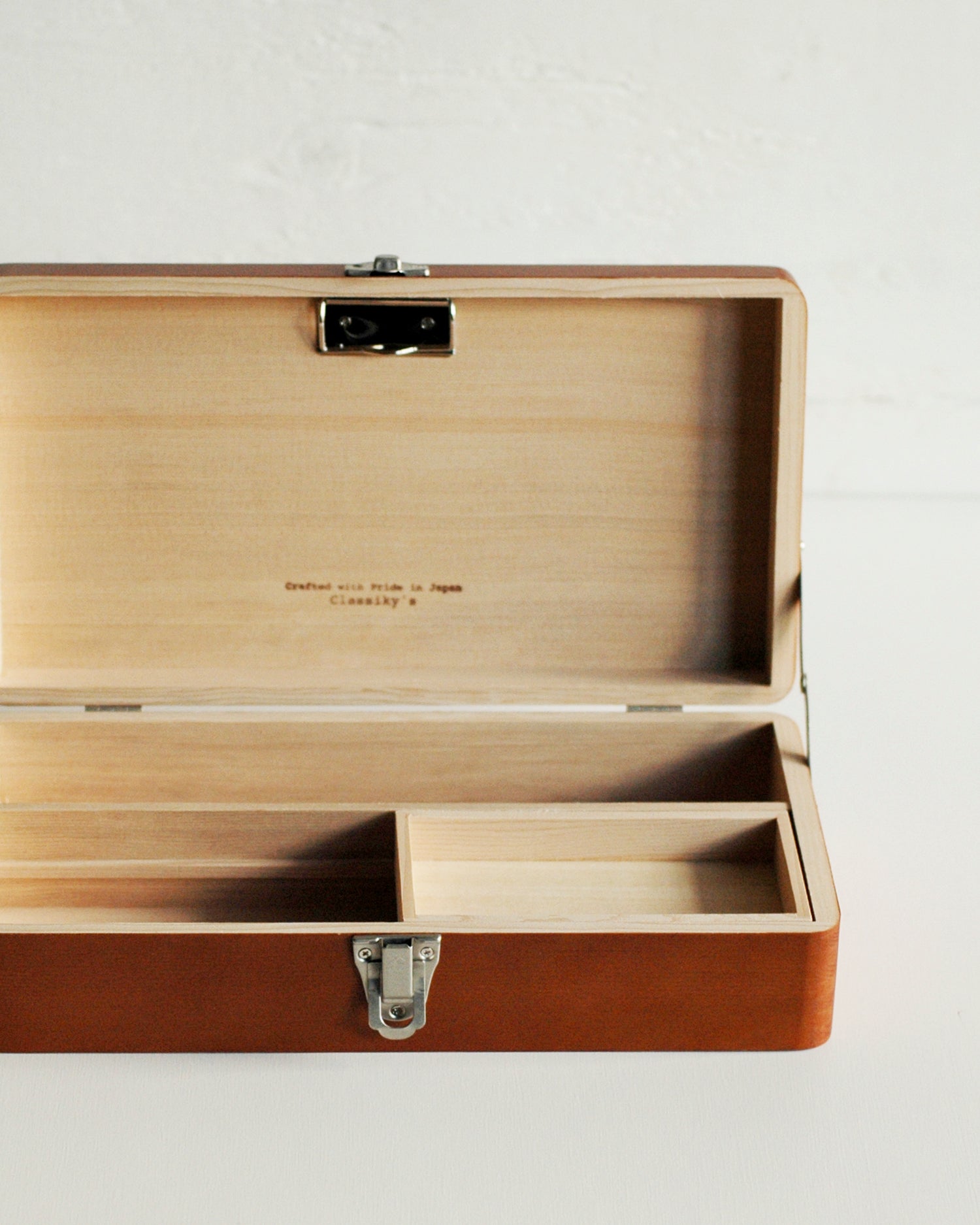 Opened Tsuga Wood Toolbox by Classiky on a gray background