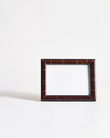 Landscape wooden picture frame by Denshiro on a gray background