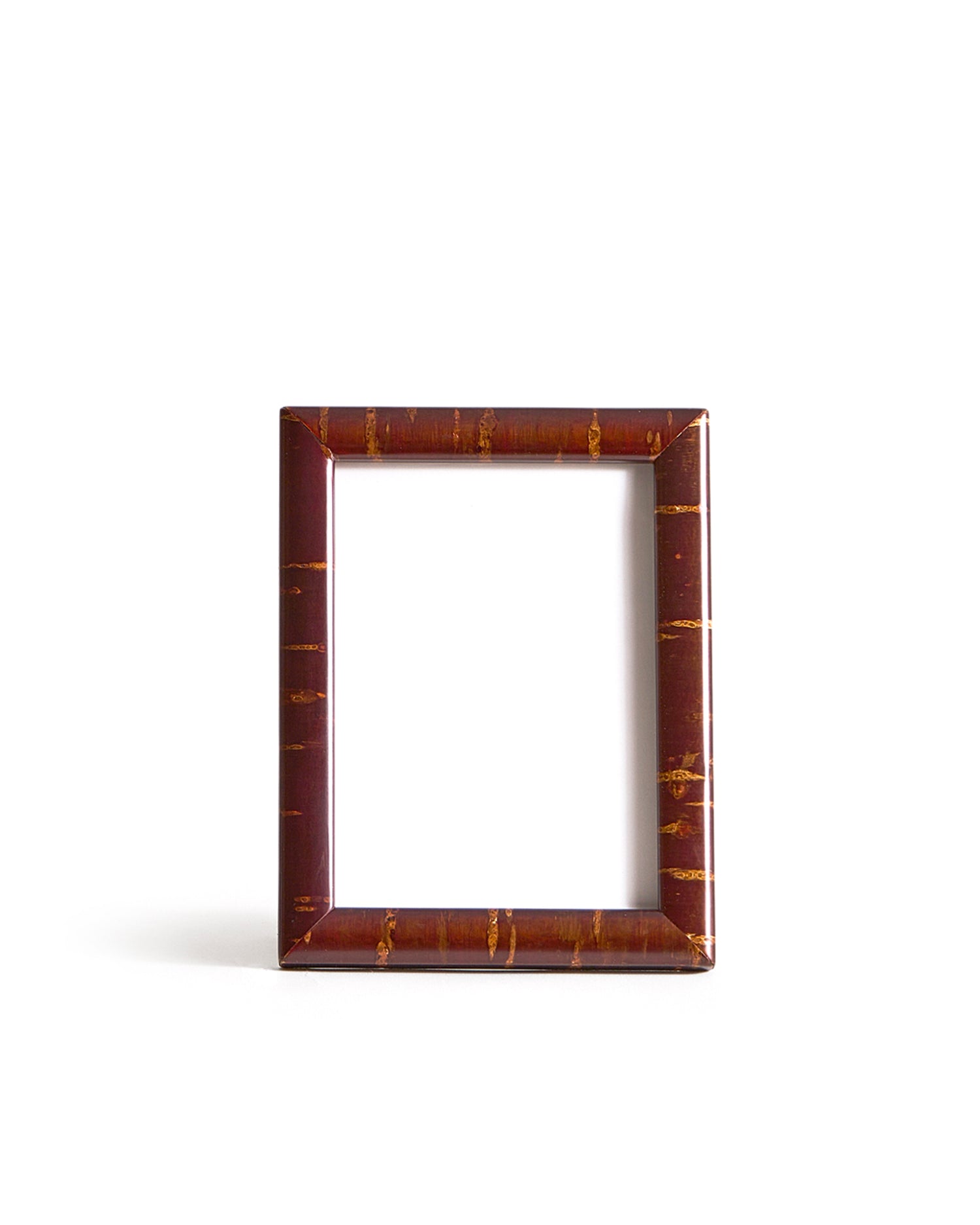 Portrait standing wooden picture frame by Denshiro in postcard size on a white background