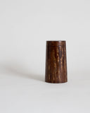Wooden cylindrical coffee container by Denshiro on a gray background