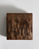 Top view of square wooden box with a textured surface by Denshiro on a light gray background