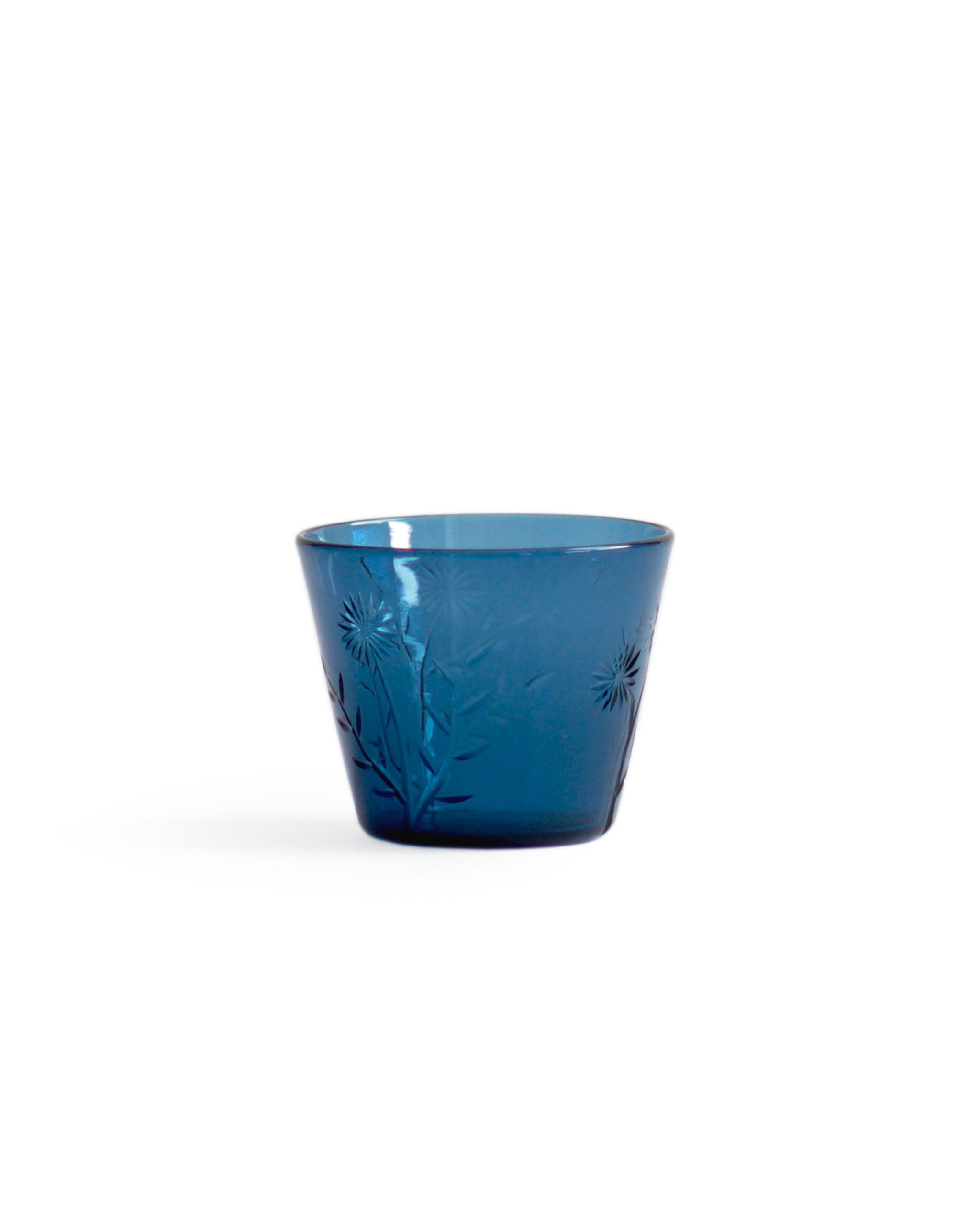 Silhouetted reclaimed blue ms.garden daily cup by factory zoomer against white background.