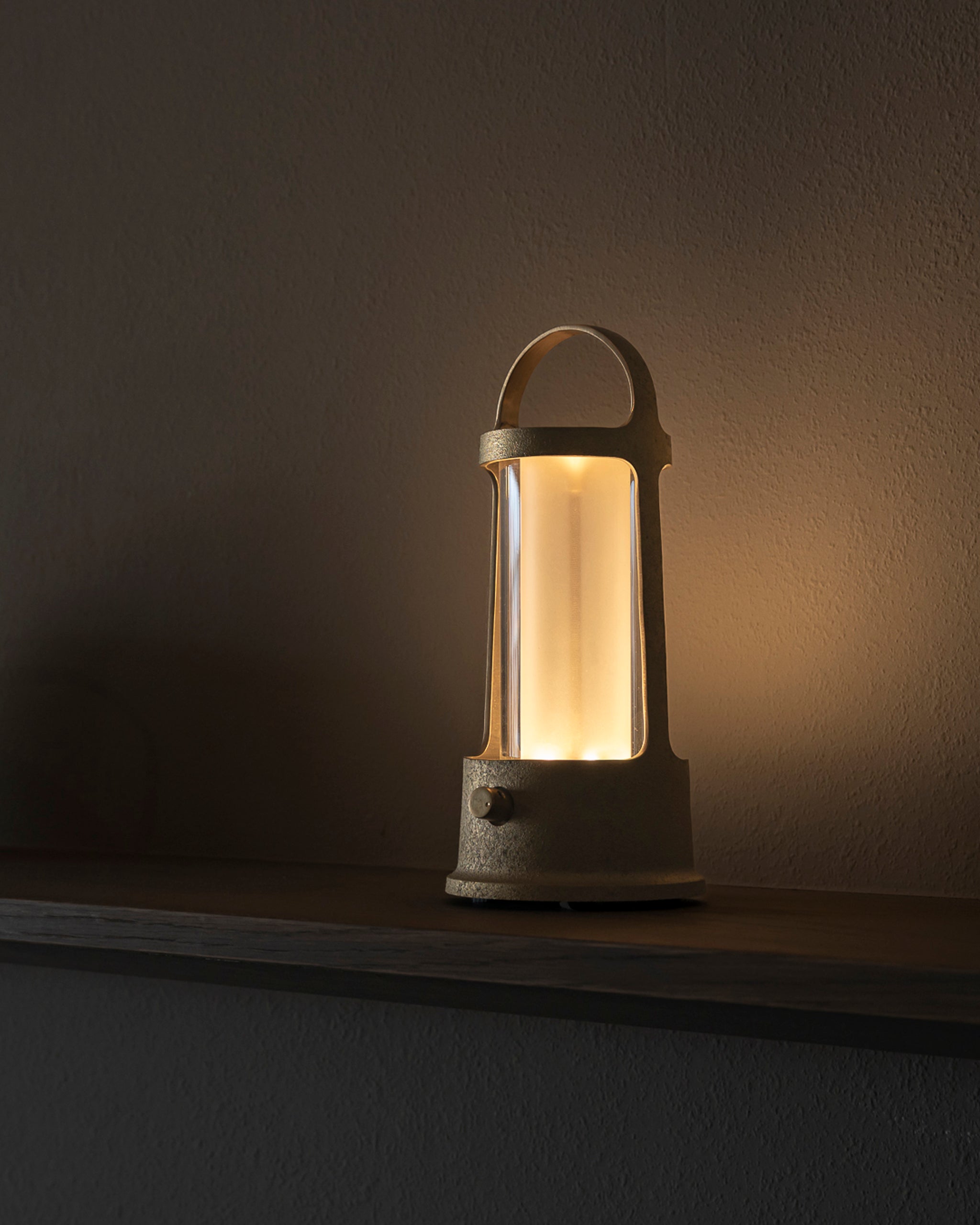Arc lantern by Futagami on a shelf 