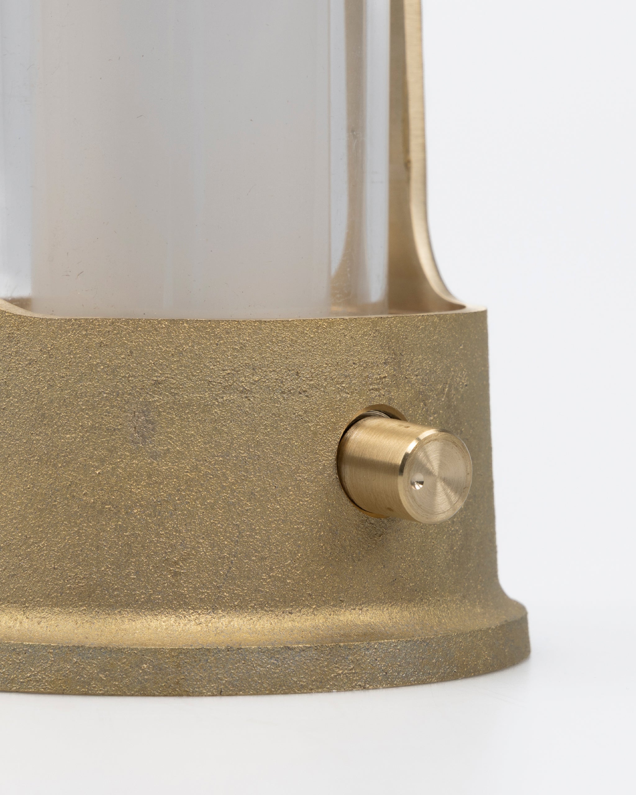 Upclose of dial dimmer on Arc lantern by Futagami on a gray background