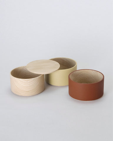Unstacked Border Three Tiered Containers in Brown, Mustard, Natural on a white background