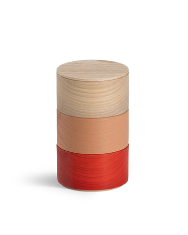 Stacked Border Three Tiered Containers in Red, Peach, Natural on a white background.
