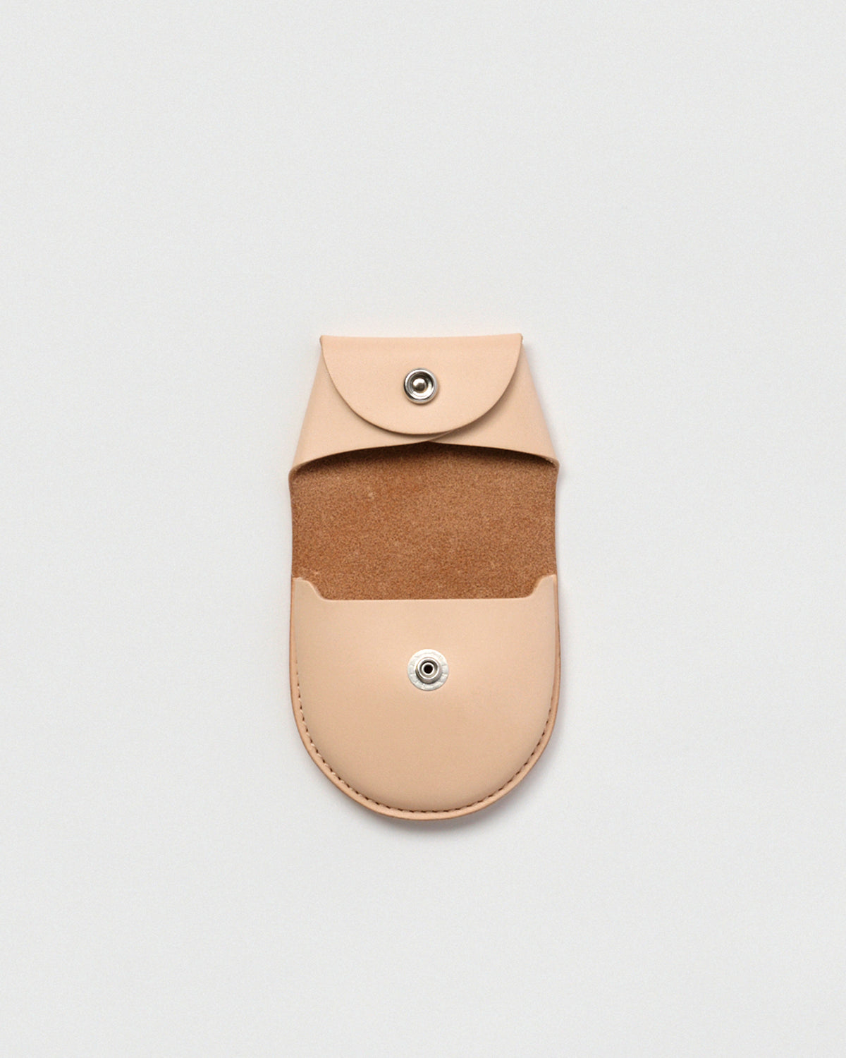 Open Coin Case by Hender Scheme on a gray background