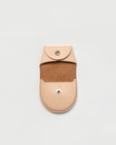 Open Coin Case by Hender Scheme on a gray background