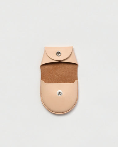 Open Coin Case by Hender Scheme on a gray background