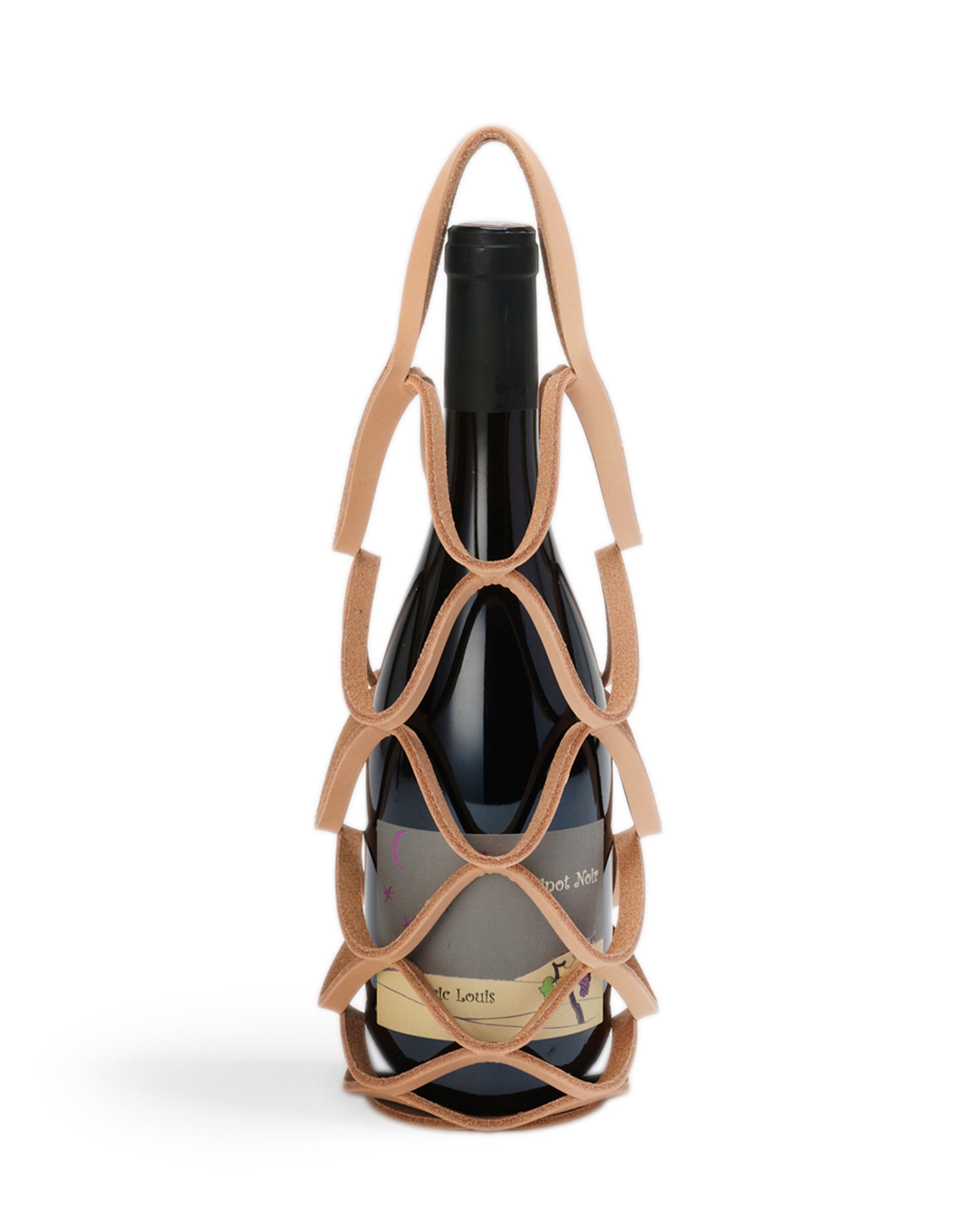 Wine bottle in wine holder by Hender Scheme with a white background