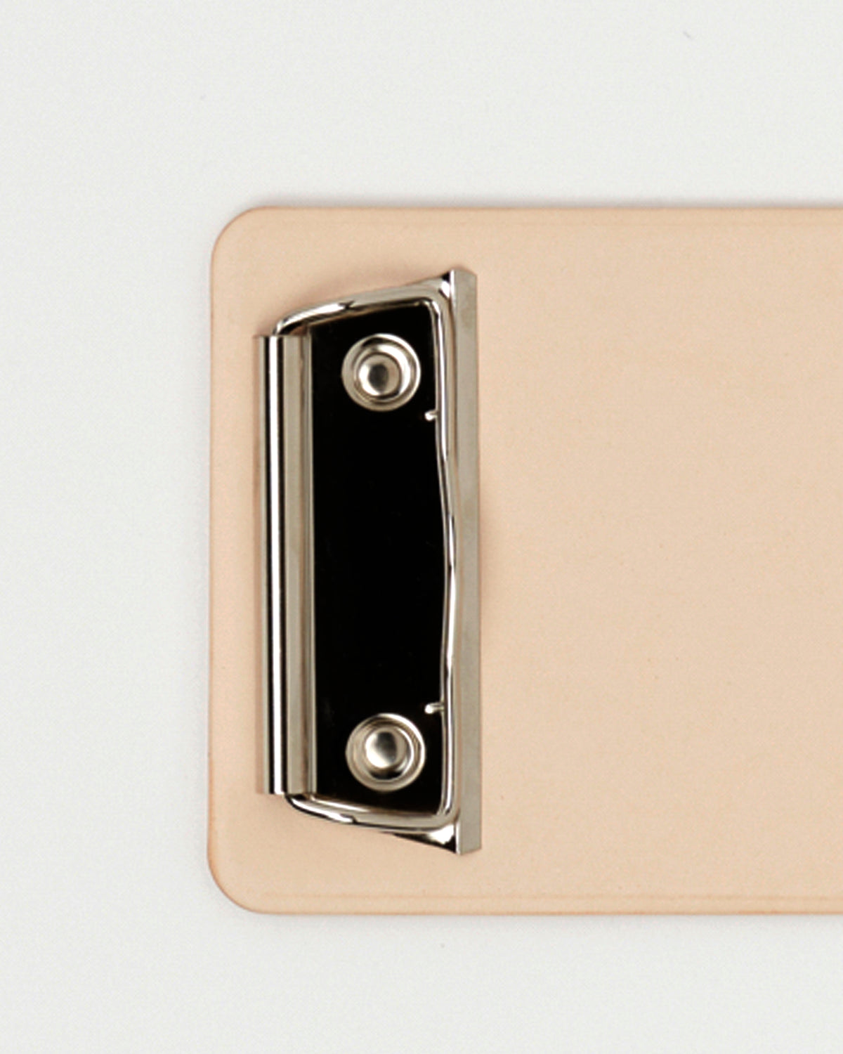 Up-close of Small Clipboard by Hender Scheme on white background