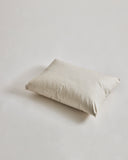 Down and Feather Pillow by Iwata on gray background