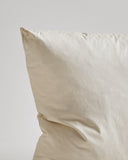 Close-up of Down and Feather Pillow by Iwata on gray background