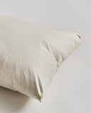 Close-up of Down and Feather Pillow by Iwata on gray background