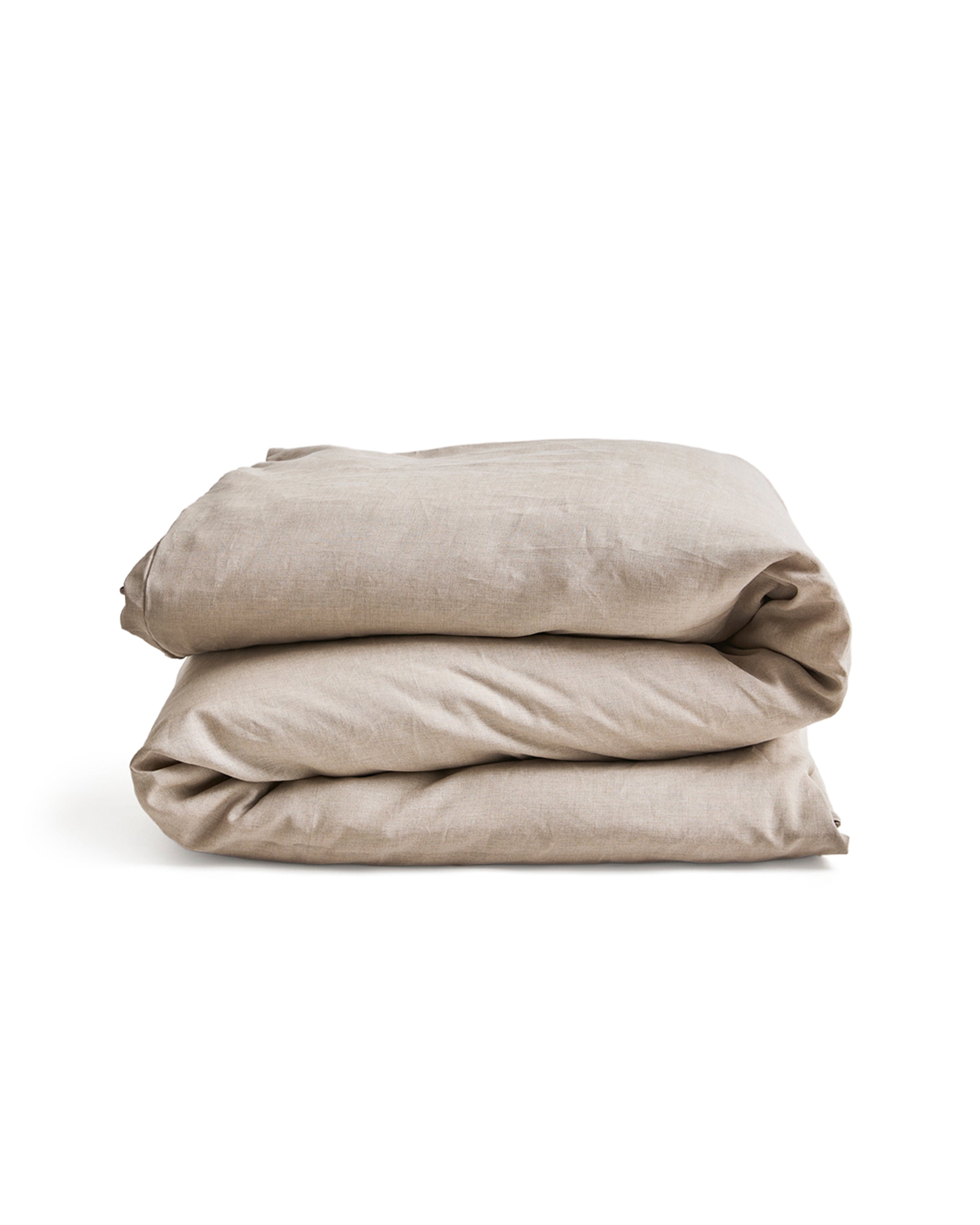  unbleached linen duvet cover on a duvet folded on a gray background