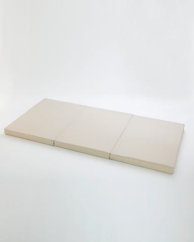 Futon Floor Pad by Iwata on a white background