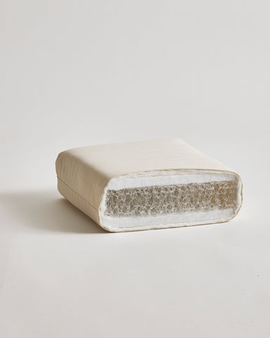 interior of futon floor pad by Iwata on a light gray background