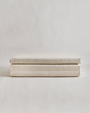 tri-fold futon floor pad by Iwata on a light gray background