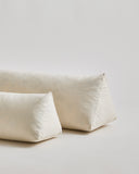 Up-close of Knee Pillows by Iwata on a gray background