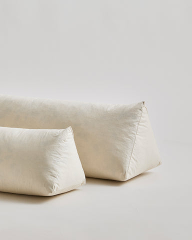 Up-close of Knee Pillows by Iwata on a gray background