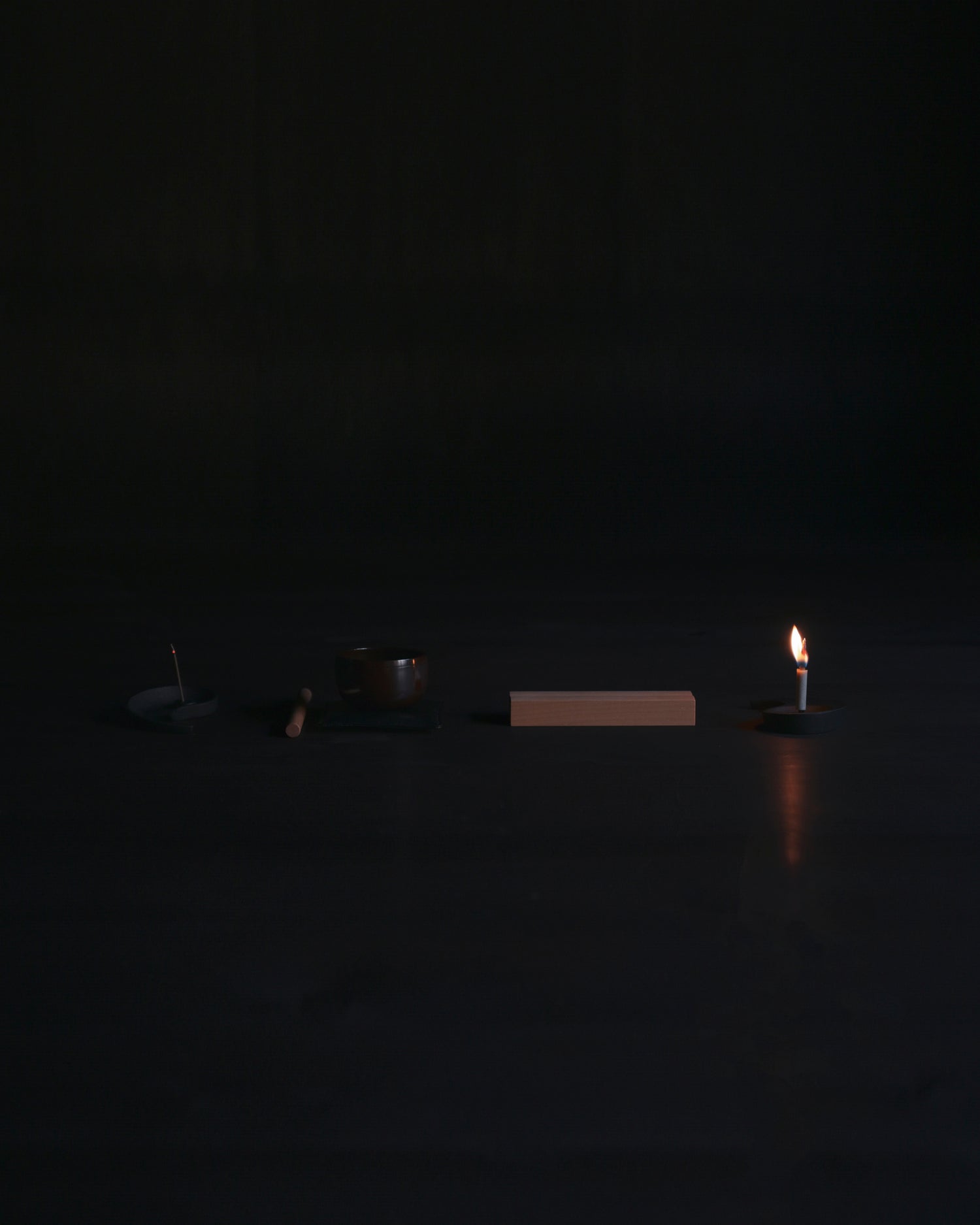 Nezen Box Set by Iwata lined up on the floor on a Black background