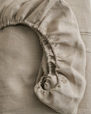 Close-up of a unbleached linen fitted sheet by iwata 