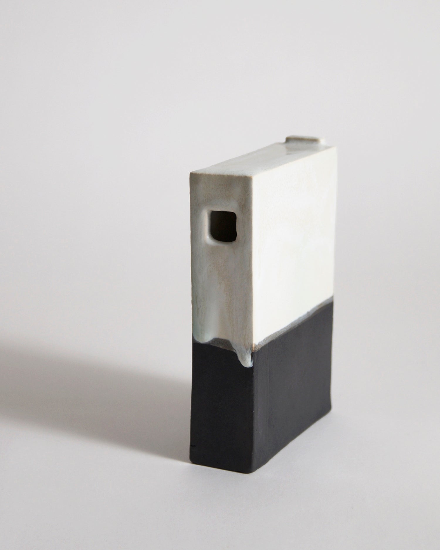Black and White Hanging Vase by Masanobu Ando on a gray background