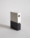 Black and White Hanging Vase by Masanobu Ando on a gray background