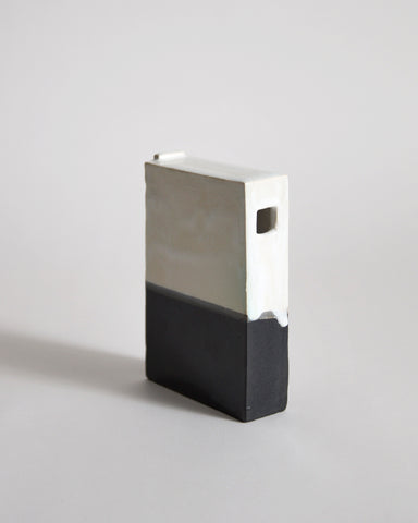 Black and White Hanging Vase by Masanobu Ando on a gray background