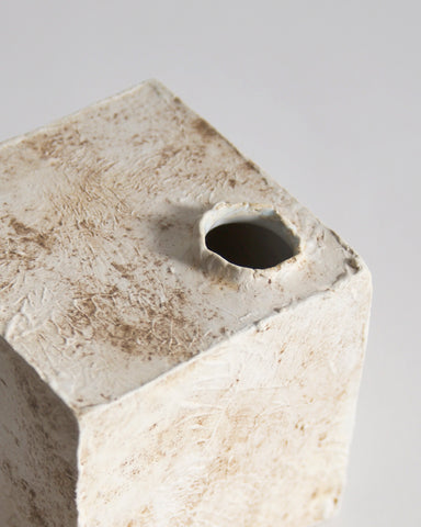 Up-close of Cube Clay Glazed Vase by Masanobu Ando on a gray backround