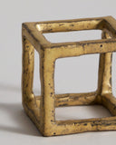 Up-close of Gold Box of Air by Masanobu Ando on a gray background