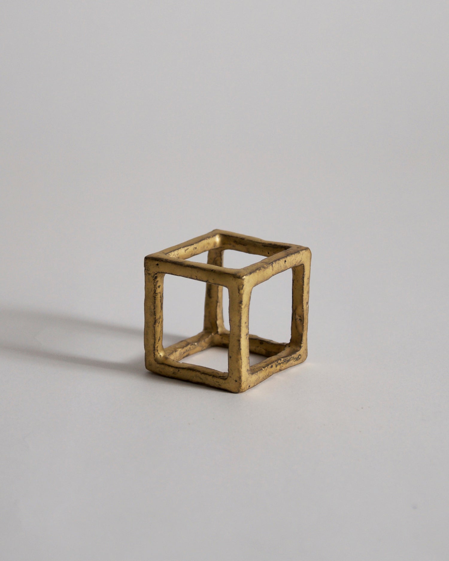 Gold Box of Air by Masanobu Ando on a gray background