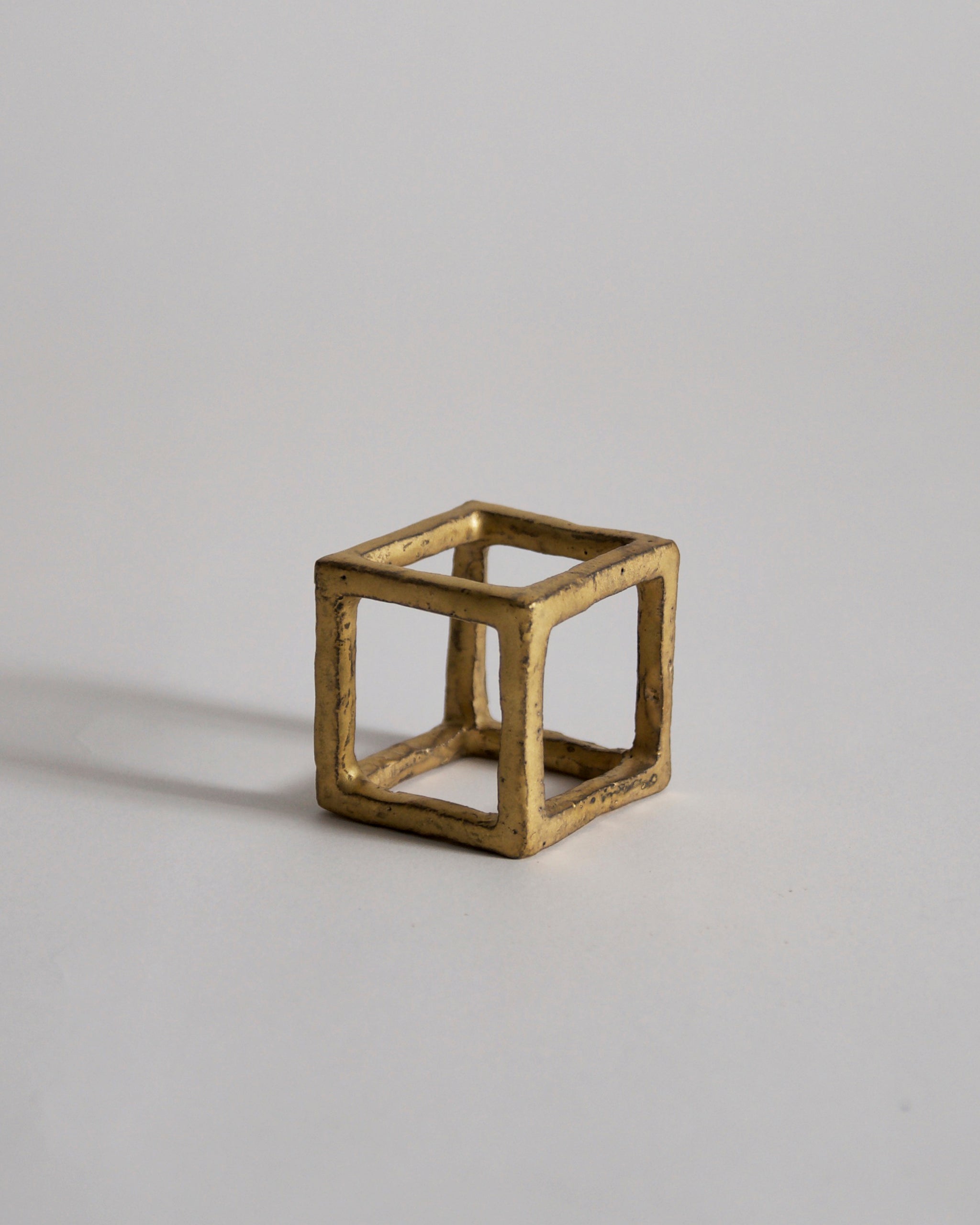 Gold Box of Air by Masanobu Ando on a gray background