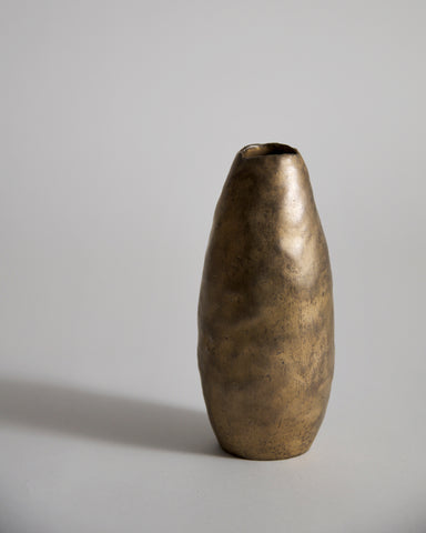 Gold Vase by Masanobu Ando on a gray background