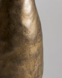 Up-close of side of Gold Vase by Masanobu Ando on a gray background