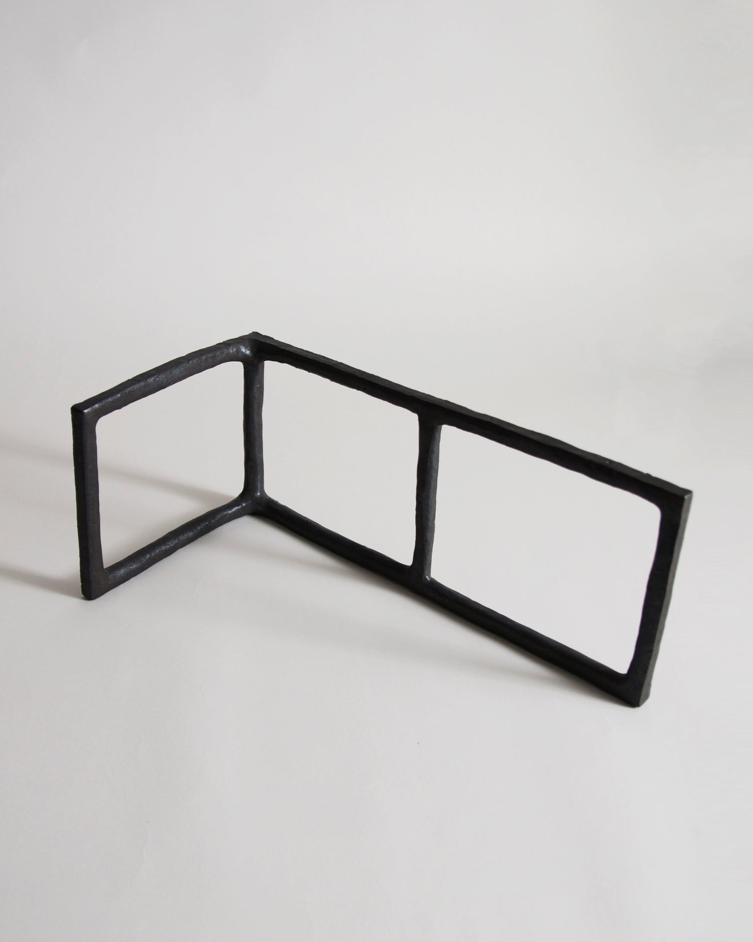 Black Rust Glaze Boundary Sculpture by Masanobu Ando on a gray background