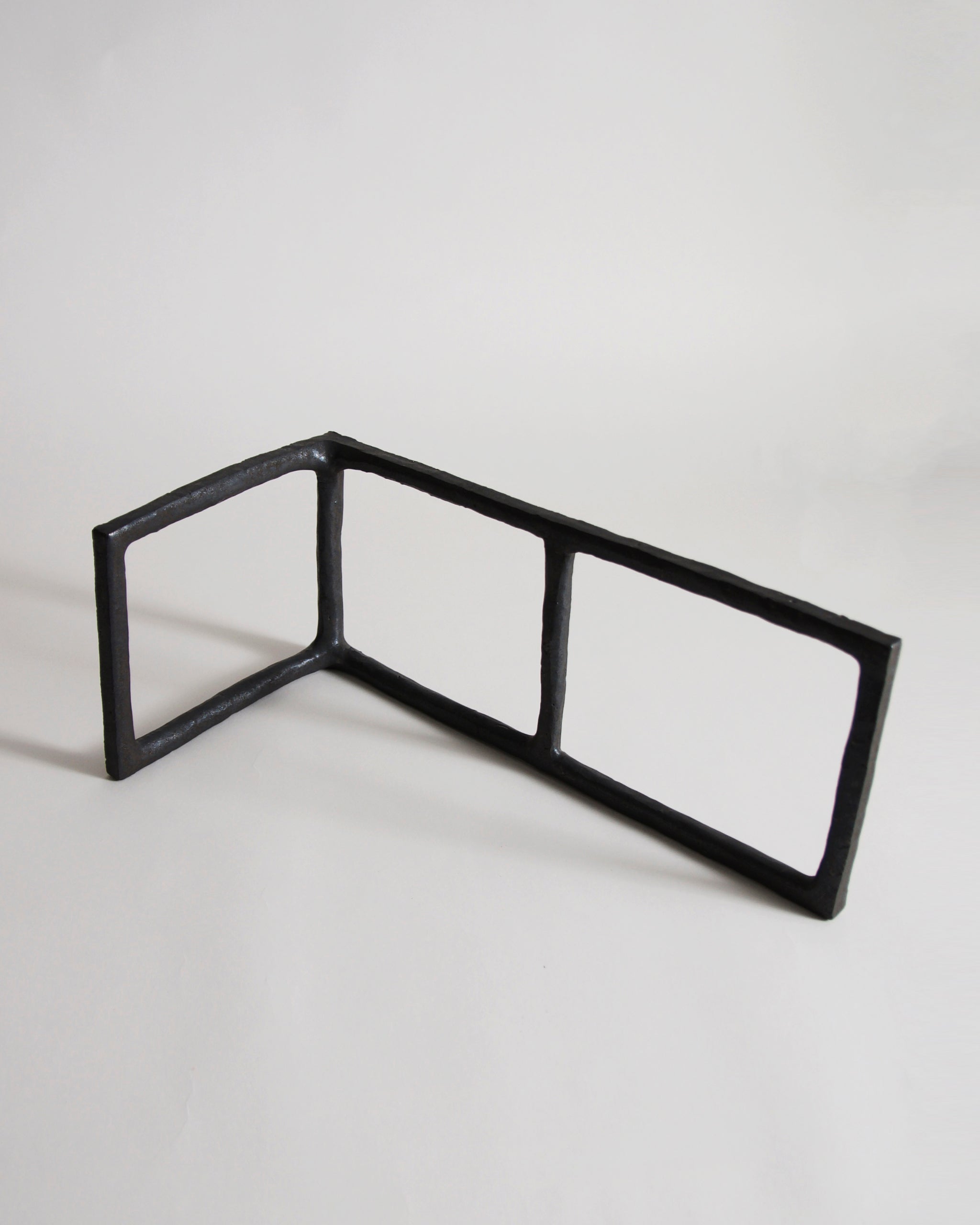 Black Rust Glaze Boundary Sculpture by Masanobu Ando on a gray background