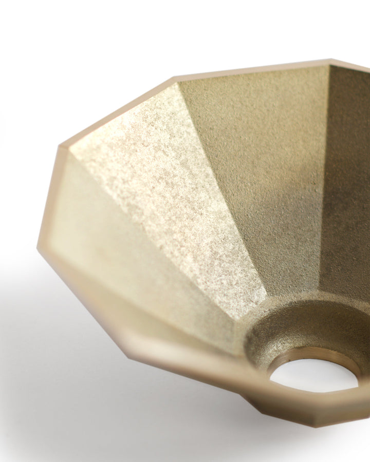 Cropped detail image of matureware wash bowl that shows the surface texture from sand casting.
