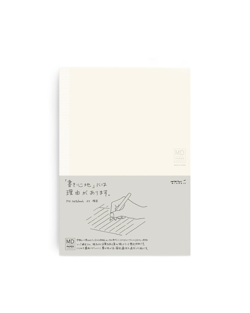 Silhouetted midori thick ruled a5 notebook against white background.
