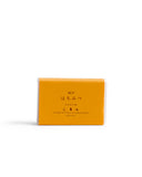 Kobe Honey Mutenka Sekken soap against a white backdrop. Packaging in orange in color.