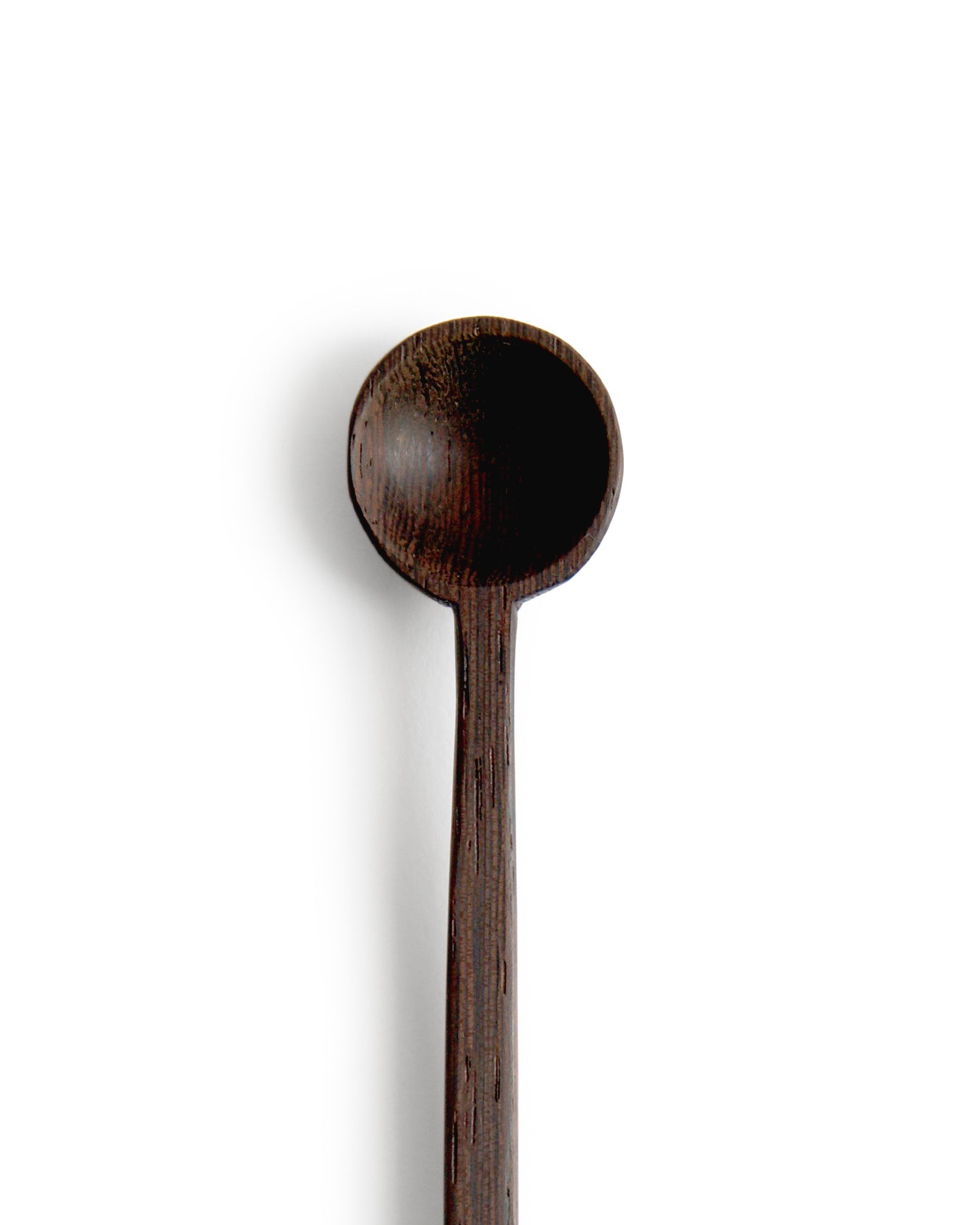 Cropped close-up image of hand carved tagaya wood spoon by Nalata Nalata against white background.
