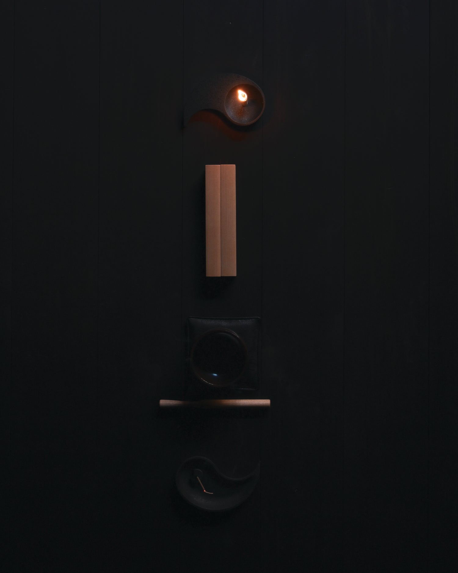 Nezen Box Set by Iwata lined up on the floor on a Black background