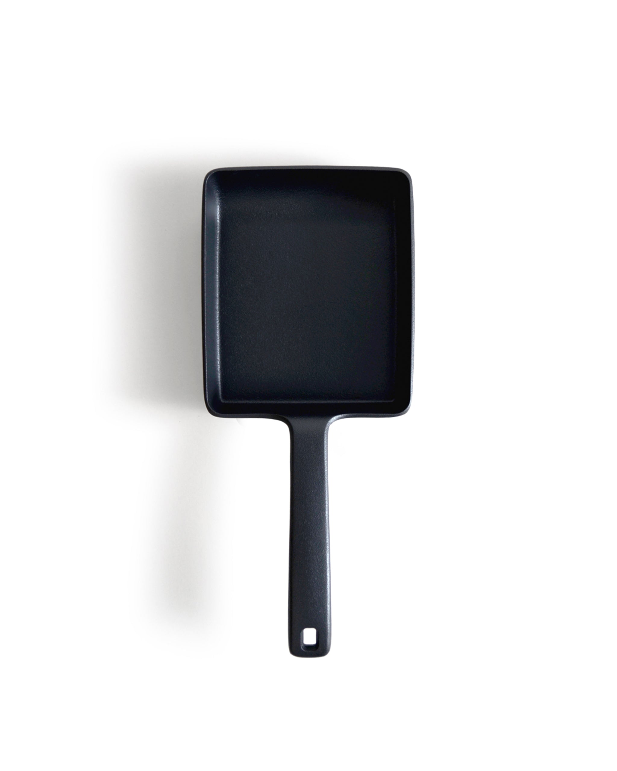 Cast Iron omelet pan by OIgen on a white background